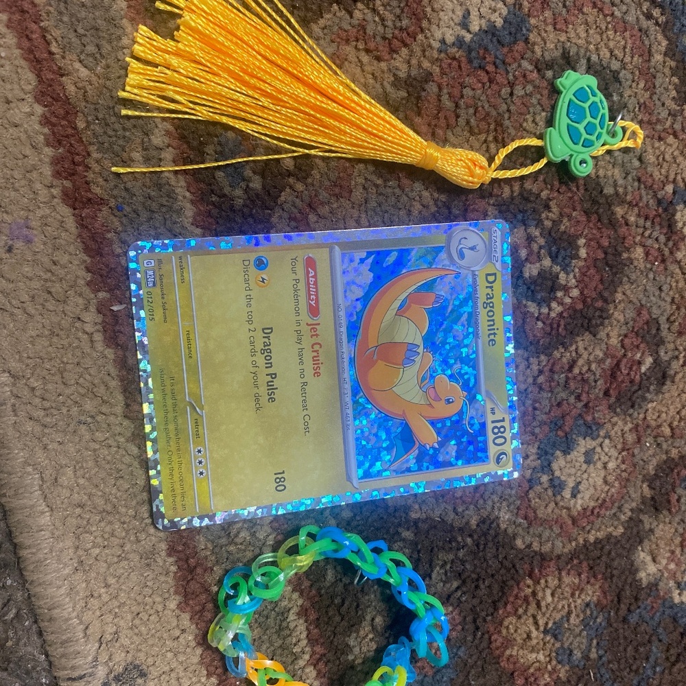 rubber band bracelet, pokémon, and keychain thingy